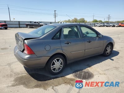 Trzecie zdjęcie samochodu z tyłu: 2002 FORD FOCUS SE VIN:1FAFP34332W127777 - miniatura