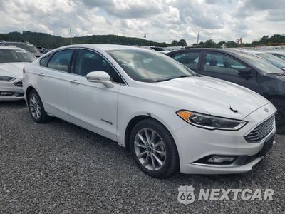 Czwarte zdjęcie samochodu z boku: 2017 FORD FUSION SE HYBRID VIN:3FA6P0LU2HR409431 - miniatura