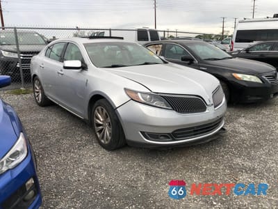 2014 LINCOLN MKS 1LNHL9EK3EG609885 - główne zdjęcie licytacji z USA - miniatura