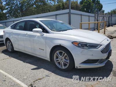 Czwarte zdjęcie samochodu z boku: 2018 FORD FUSION SE HYBRID VIN:3FA6P0LU1JR129957 - miniatura