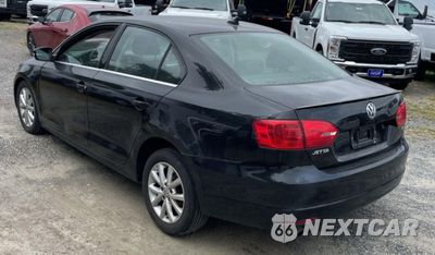 Trzecie zdjęcie samochodu z tyłu: 2014 VOLKSWAGEN JETTA SE VIN:3VWD17AJ3EM289634 - miniatura