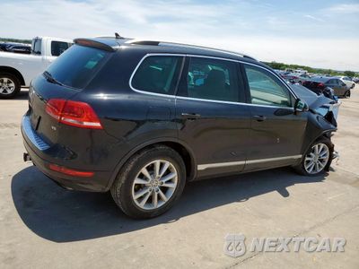 Trzecie zdjęcie samochodu z tyłu: 2014 VOLKSWAGEN TOUAREG V6 VIN:WVGEF9BP3ED012609 - miniatura