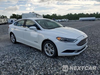 Czwarte zdjęcie samochodu z boku: 2018 FORD FUSION SE HYBRID VIN:3FA6P0LUXJR278738 - miniatura