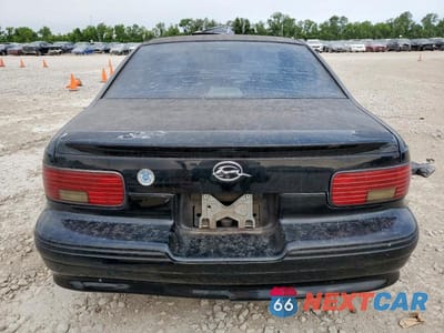 Zdjęcie 6 z 12 samochodu: 1994 CHEVROLET CAPRICE CLASSIC LS VIN:1G1BN52P8RR162011 - miniatura