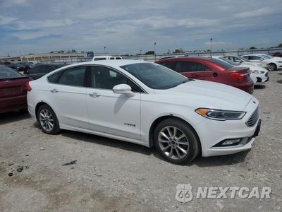 Czwarte zdjęcie samochodu z boku: 2017 FORD FUSION SE HYBRID VIN:3FA6P0LU4HR409690 - miniatura