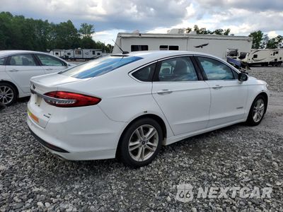 Trzecie zdjęcie samochodu z tyłu: 2018 FORD FUSION SE HYBRID VIN:3FA6P0LU9JR118771 - miniatura