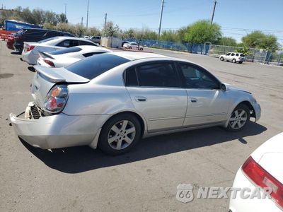 Trzecie zdjęcie samochodu z tyłu: 2003 NISSAN ALTIMA BASE VIN:1N4AL11E13C242591 - miniatura
