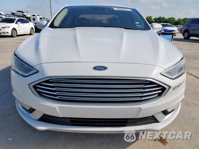 Piąte zdjęcie samochodu w środku: 2017 FORD FUSION SE HYBRID VIN:3FA6P0LU9HR410155 - miniatura