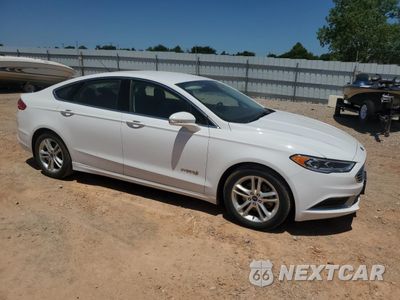 Czwarte zdjęcie samochodu z boku: 2018 FORD FUSION SE HYBRID VIN:3FA6P0LUXJR171835 - miniatura