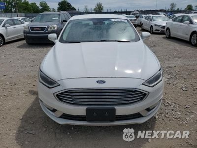 Piąte zdjęcie samochodu w środku: 2017 FORD FUSION SE HYBRID VIN:3FA6P0LU7HR409599 - miniatura