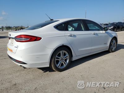 Trzecie zdjęcie samochodu z tyłu: 2018 FORD FUSION SE HYBRID VIN:3FA6P0LU5JR178479 - miniatura
