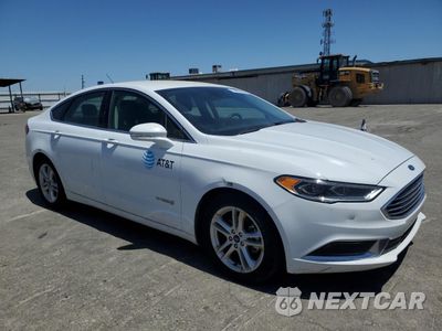 Czwarte zdjęcie samochodu z boku: 2018 FORD FUSION SE HYBRID VIN:3FA6P0LU6JR171542 - miniatura