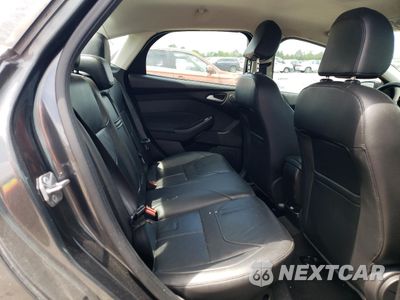 Zdjęcie 10 z 12 samochodu: 2016 FORD FOCUS TITANIUM VIN:1FADP3J29GL384695 - miniatura