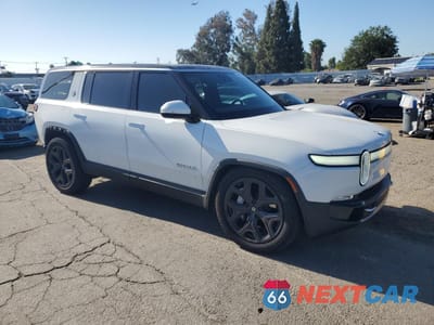 Czwarte zdjęcie samochodu z boku: 2024 RIVIAN R1S ADVENTURE VIN:7PDSGBBA3RN029670 - miniatura