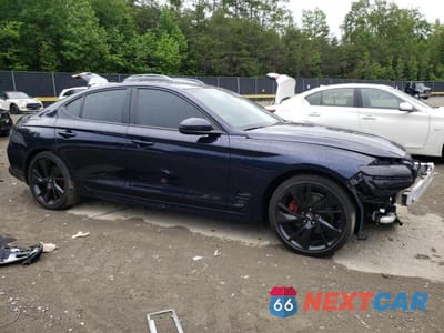Czwarte zdjęcie samochodu z boku: 2023 GENESIS G70 BASE VIN:KMTG34TA0PU109872 - miniatura