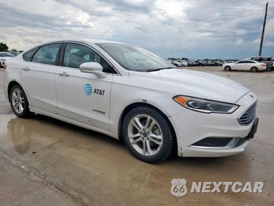 Czwarte zdjęcie samochodu z boku: 2018 FORD FUSION SE HYBRID VIN:3FA6P0LUXJR171656 - miniatura