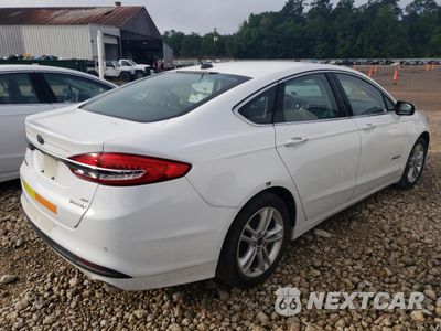 Trzecie zdjęcie samochodu z tyłu: 2018 FORD FUSION SE HYBRID VIN:3FA6P0LU9JR118804 - miniatura