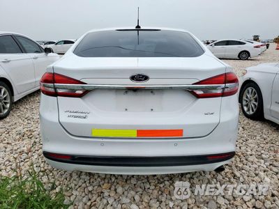 Zdjęcie 6 z 13 samochodu: 2017 FORD FUSION SE HYBRID VIN:3FA6P0LU5HR409553 - miniatura
