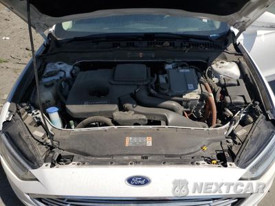 Zdjęcie 11 z 13 samochodu: 2018 FORD FUSION SE HYBRID VIN:3FA6P0LU4JR172141 - miniatura