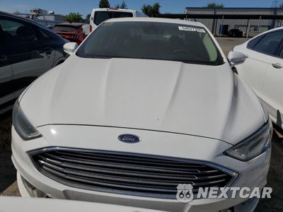 Piąte zdjęcie samochodu w środku: 2018 FORD FUSION SE HYBRID VIN:3FA6P0LU7JR171596 - miniatura