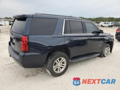 Trzecie zdjęcie samochodu z tyłu: 2019 CHEVROLET TAHOE C1500 LT VIN:1GNSCBKC5KR218864 - miniatura