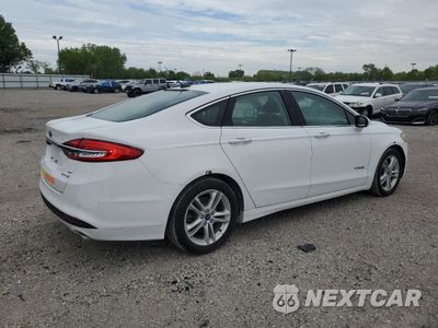 Trzecie zdjęcie samochodu z tyłu: 2018 FORD FUSION SE HYBRID VIN:3FA6P0LU3JR118796 - miniatura