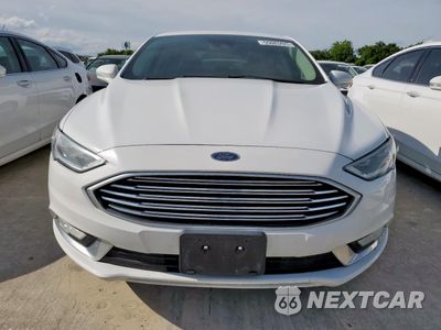 Piąte zdjęcie samochodu w środku: 2017 FORD FUSION SE HYBRID VIN:3FA6P0LU1HR408982 - miniatura