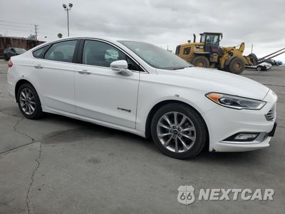 Czwarte zdjęcie samochodu z boku: 2017 FORD FUSION SE HYBRID VIN:3FA6P0LU7HR409344 - miniatura