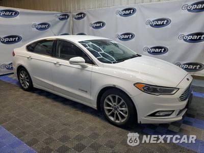 Czwarte zdjęcie samochodu z boku: 2017 FORD FUSION SE HYBRID VIN:3FA6P0LU4HR409611 - miniatura