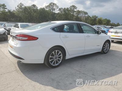 Trzecie zdjęcie samochodu z tyłu: 2017 FORD FUSION SE HYBRID VIN:3FA6P0LU2HR409574 - miniatura
