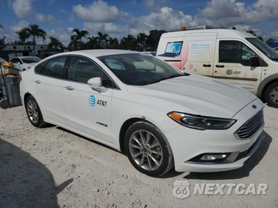 Czwarte zdjęcie samochodu z boku: 2017 FORD FUSION SE HYBRID VIN:3FA6P0LU6HR359536 - miniatura