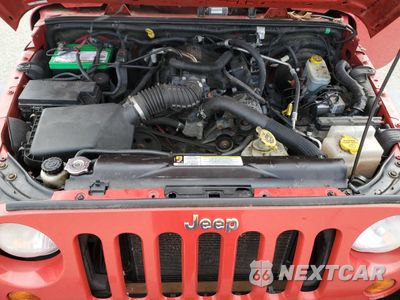 Zdjęcie 12 z 14 samochodu: 2007 JEEP WRANGLER X VIN:1J8GA39177L215188 - miniatura