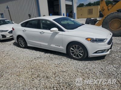 Czwarte zdjęcie samochodu z boku: 2017 FORD FUSION SE HYBRID VIN:3FA6P0LUXHR409614 - miniatura