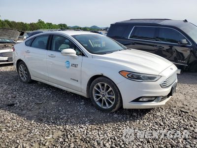 Czwarte zdjęcie samochodu z boku: 2017 FORD FUSION SE HYBRID VIN:3FA6P0LU3HR409518 - miniatura