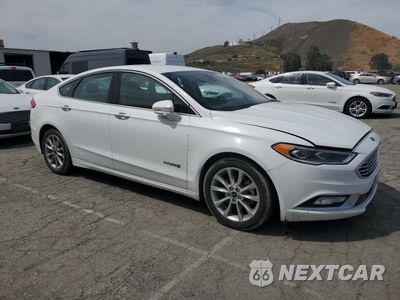 Czwarte zdjęcie samochodu z boku: 2017 FORD FUSION SE HYBRID VIN:3FA6P0LU0HR408942 - miniatura