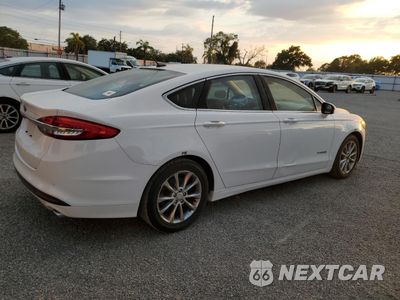 Trzecie zdjęcie samochodu z tyłu: 2017 FORD FUSION SE HYBRID VIN:3FA6P0LU8HR409577 - miniatura