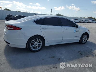 Trzecie zdjęcie samochodu z tyłu: 2018 FORD FUSION SE HYBRID VIN:3FA6P0LU2JR278698 - miniatura