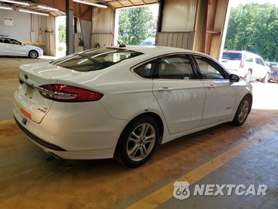 Trzecie zdjęcie samochodu z tyłu: 2018 FORD FUSION SE HYBRID VIN:3FA6P0LU0JR278683 - miniatura