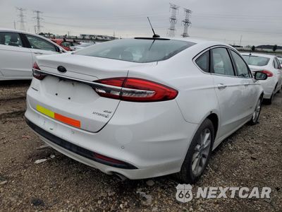 Trzecie zdjęcie samochodu z tyłu: 2018 FORD FUSION SE HYBRID VIN:3FA6P0LU4JR118709 - miniatura