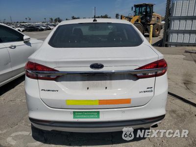 Zdjęcie 6 z 12 samochodu: 2018 FORD FUSION SE HYBRID VIN:3FA6P0LU5JR171709 - miniatura