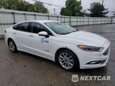 Czwarte zdjęcie samochodu z boku: 2017 FORD FUSION SE HYBRID VIN:3FA6P0LU9HR410074 - miniatura