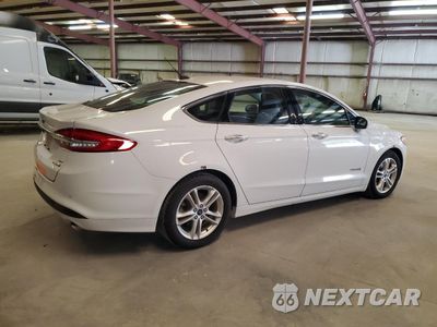 Trzecie zdjęcie samochodu z tyłu: 2018 FORD FUSION SE HYBRID VIN:3FA6P0LUXJR281882 - miniatura