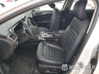 Zdjęcie 7 z 12 samochodu: 2017 FORD FUSION SE HYBRID VIN:3FA6P0LU6HR359584 - miniatura