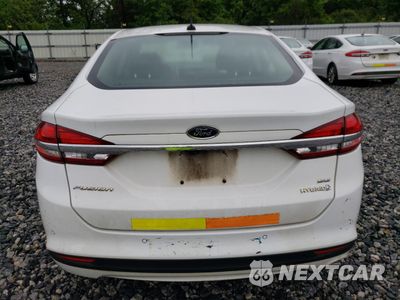 Zdjęcie 6 z 12 samochodu: 2018 FORD FUSION SE HYBRID VIN:3FA6P0LU7JR171775 - miniatura