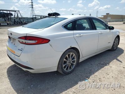 Trzecie zdjęcie samochodu z tyłu: 2017 FORD FUSION SE HYBRID VIN:3FA6P0LU5HR408953 - miniatura