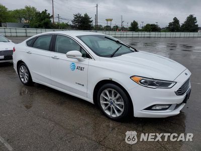 Czwarte zdjęcie samochodu z boku: 2017 FORD FUSION SE HYBRID VIN:3FA6P0LU4HR359552 - miniatura