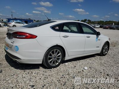 Trzecie zdjęcie samochodu z tyłu: 2017 FORD FUSION SE HYBRID VIN:3FA6P0LU8HR359621 - miniatura