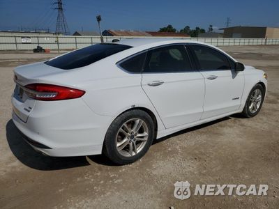 Trzecie zdjęcie samochodu z tyłu: 2018 FORD FUSION SE HYBRID VIN:3FA6P0LU7JR171694 - miniatura