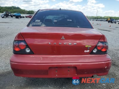 Zdjęcie 6 z 13 samochodu: 2002 MITSUBISHI LANCER ES VIN:JA3AJ26E12U030974 - miniatura