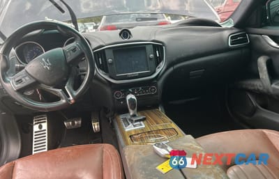Zdjęcie 9 z 10 samochodu: 2014 MASERATI GHIBLI VIN:ZAM57XSAXE1105514 - miniatura
